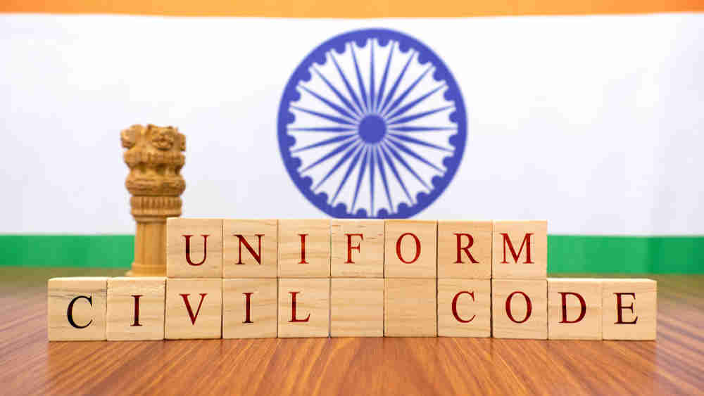 Discuss the possible factors that inhibit India from enacting for its citizens a uniform civil code as provided for in the Directive Principles of State Policy.