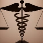 Healthcare in Crisis: The COVID-19 Pandemic and the Urgent Need for Healthcare Law Reform Worldwide